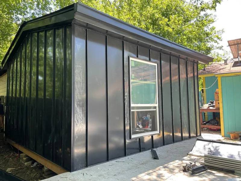 Black standing seam metal wall panels for Roof Inspection in North Middleton