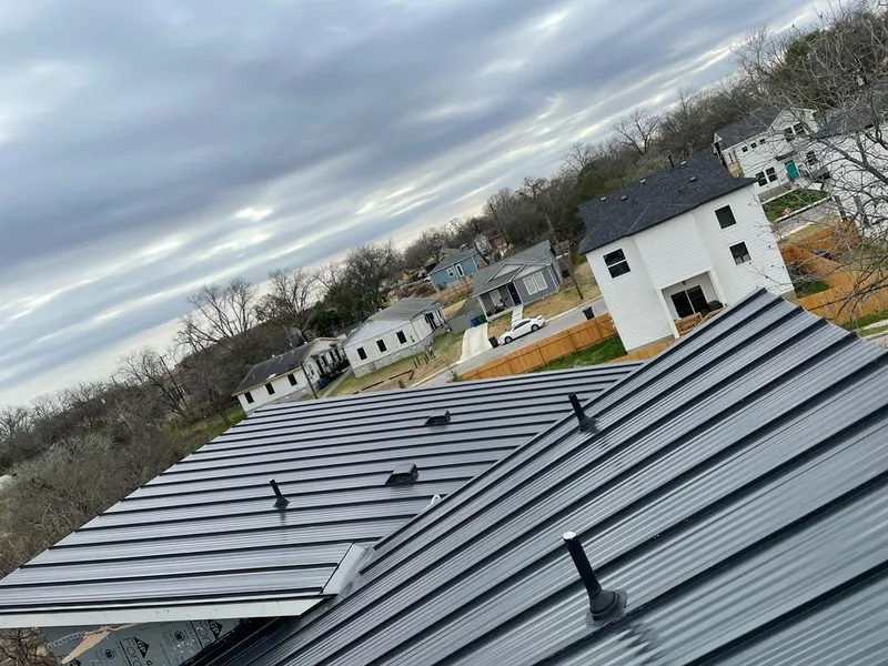 Standing seam metal roof panels with vents for Skylight Repair in North Middleton